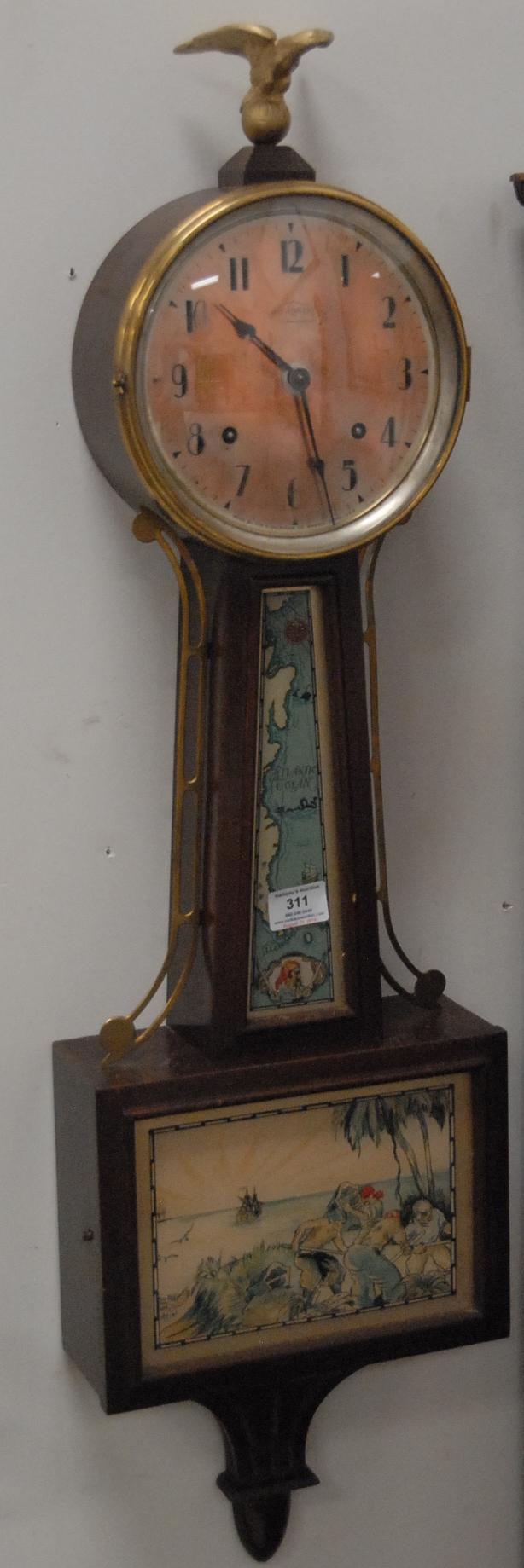 Lot 311 Ingraham Treasure Island banjo clock, ht. 38 in. Nadeau's