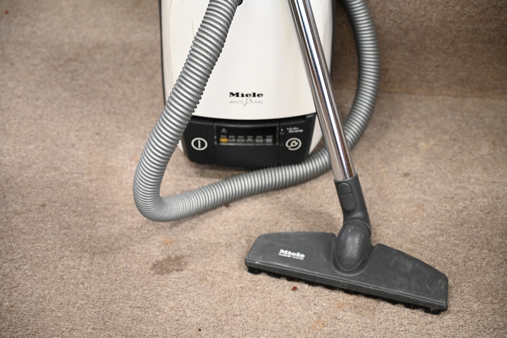 Miele White Vacuum, having parquet