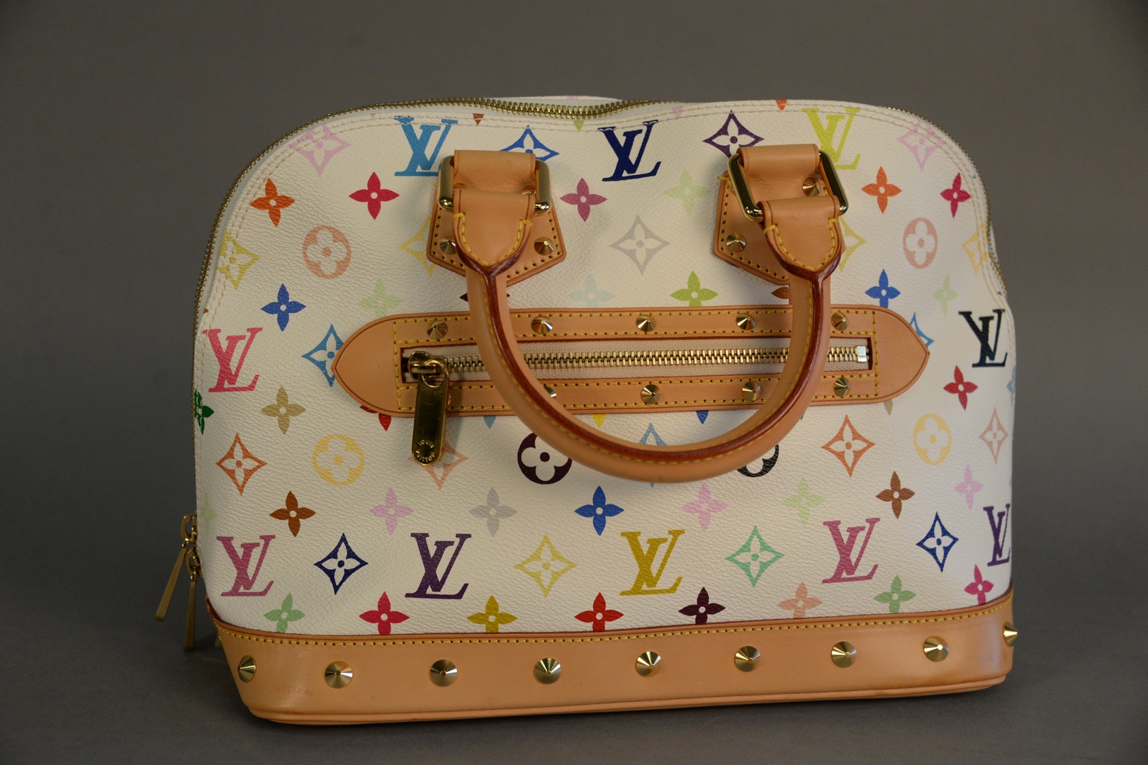 Louis Vuitton white monogrammed tote or handbag, red interior with leather  serial tag, FL0083, and dust bag, ht. 9, wd. 12, dp. 6.25. sold at  auction on 26th September