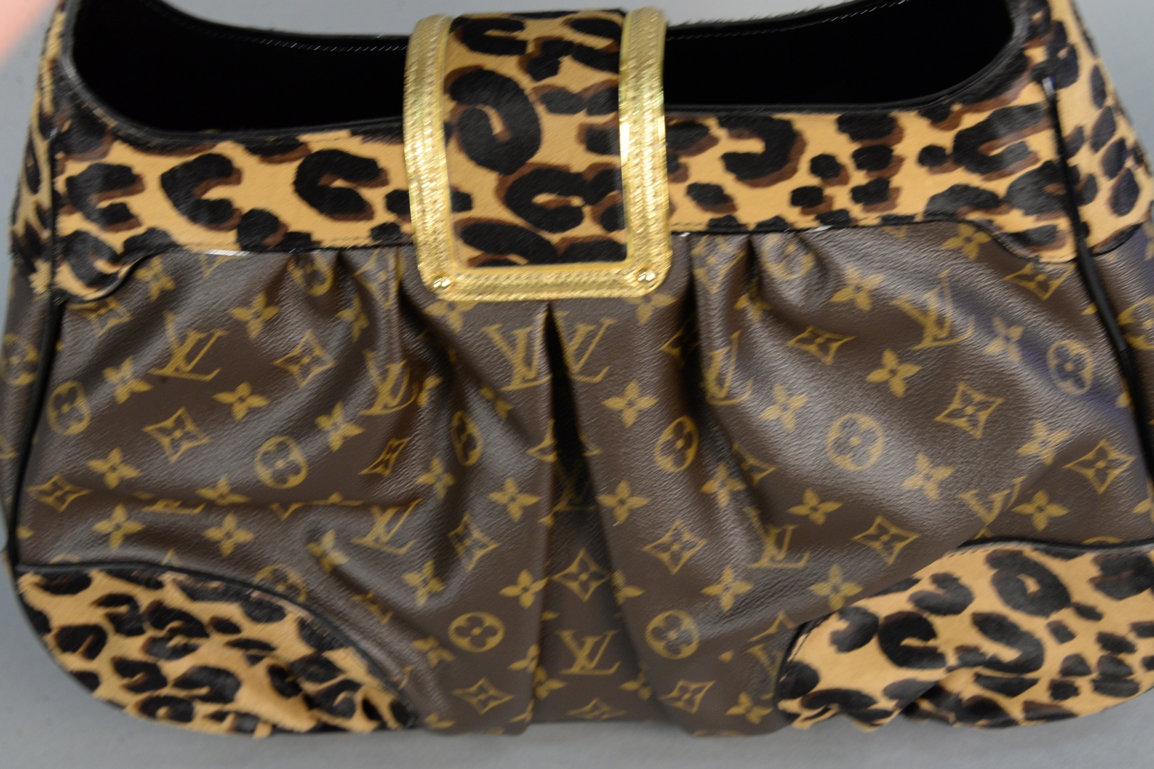Sold at Auction: Louis Vuitton leopard print monogram handbag, 'Polly Leo'  having original box, dust bag, tags and receipt, new price $3,940.